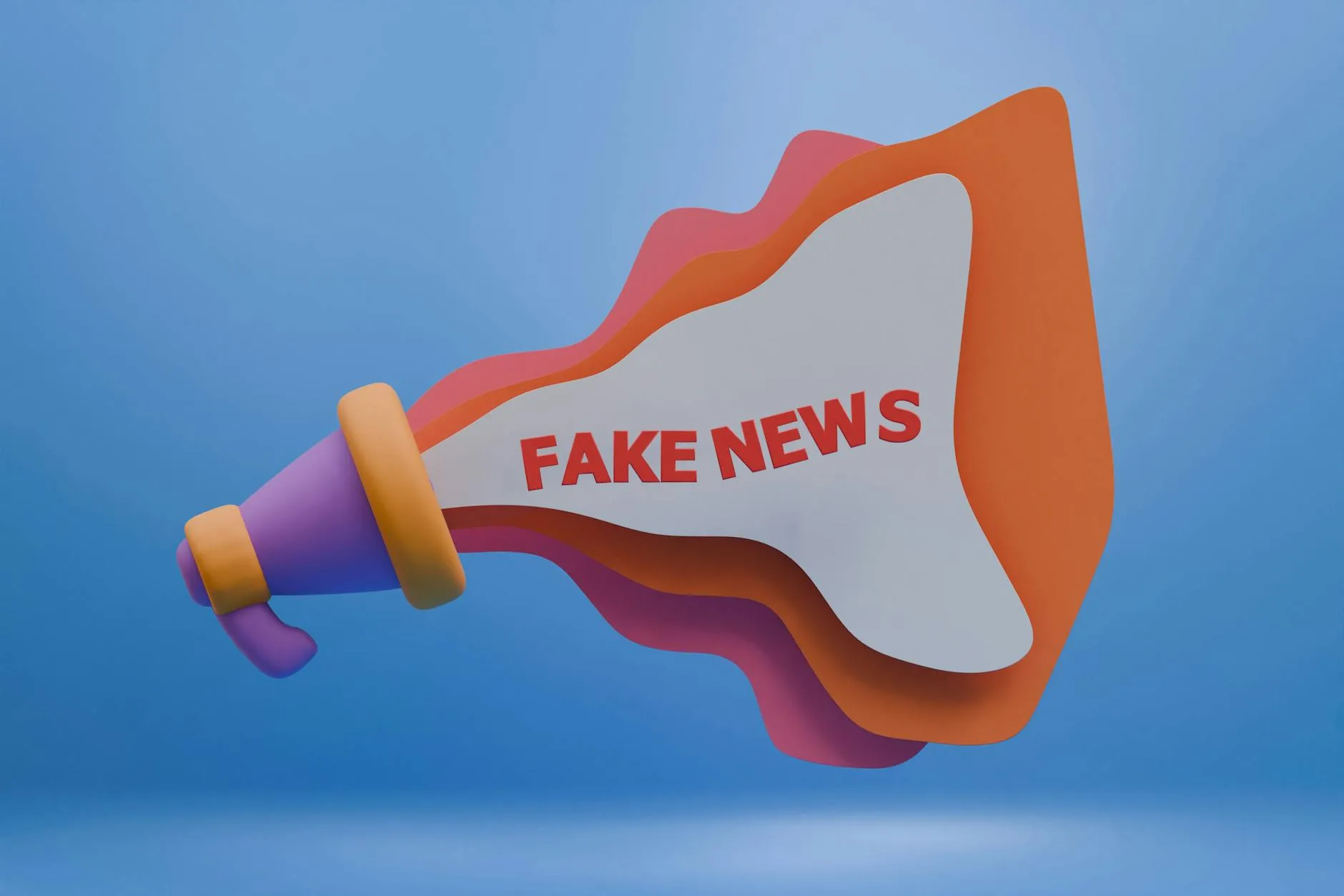 Kolorowy megafon z napisem Fake News symbolizujący fałszywe informacje